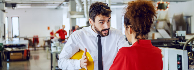 boss yelling at female worker