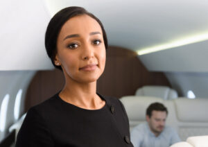 female person of color flight attendant